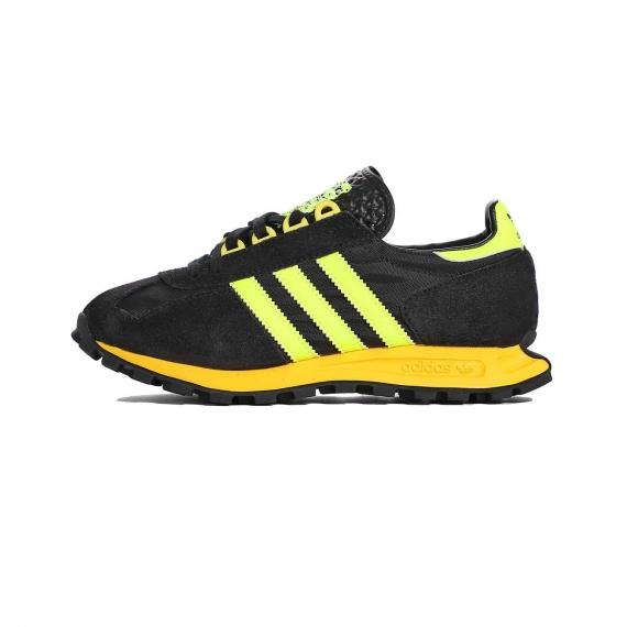 کفش ورزشی ادیداس مدل ریسنگ1 با رنگ مشکی و زرد با رویه جیر و پارچه توری از نمای بیرون پا چپ